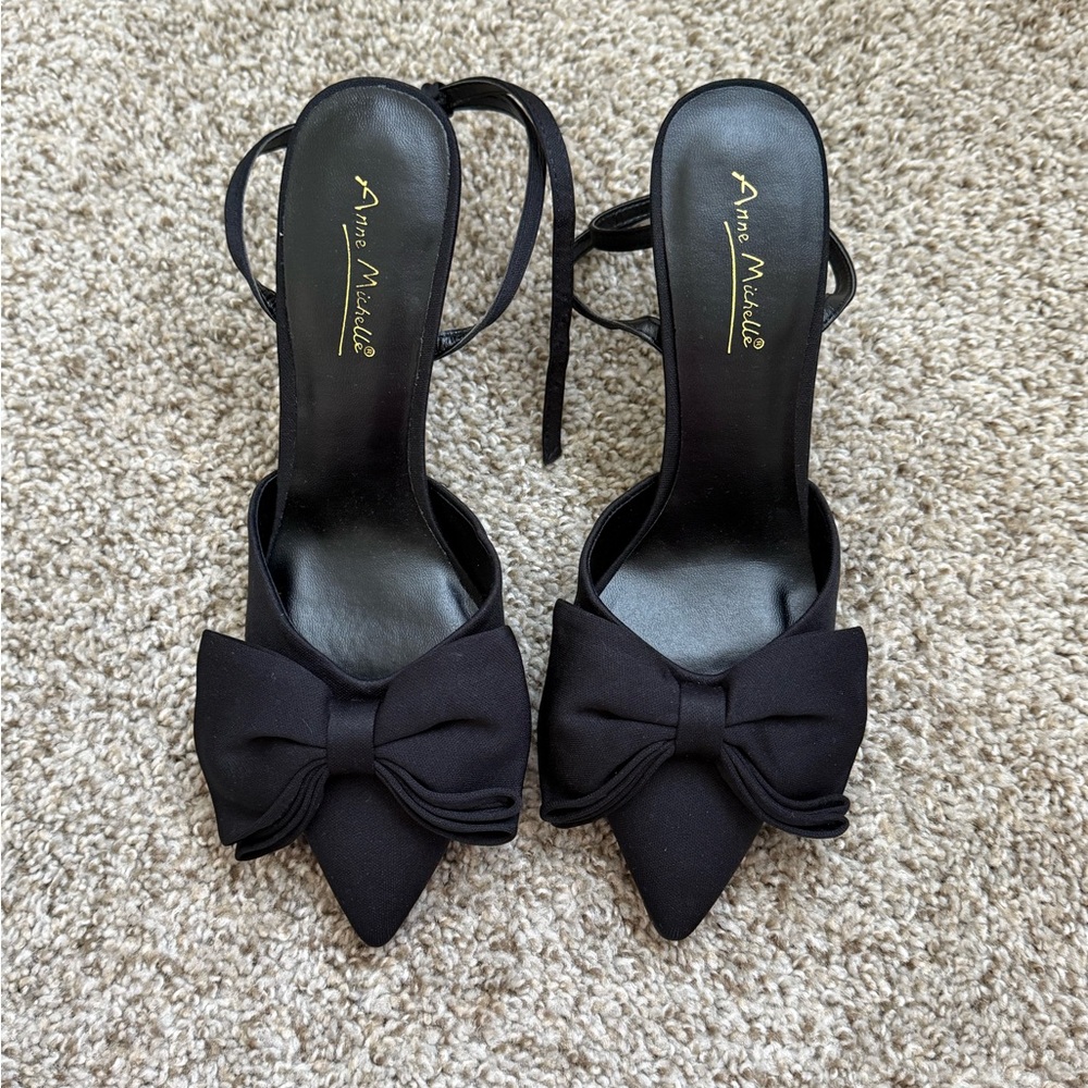 Black pointed toe heels